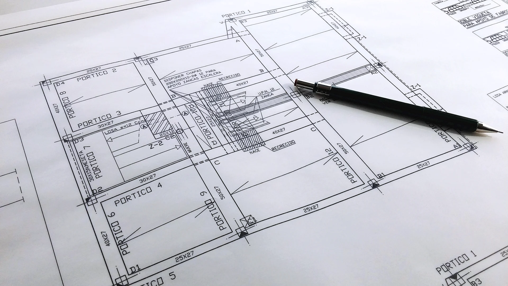 Architect drawing on a Blueprint