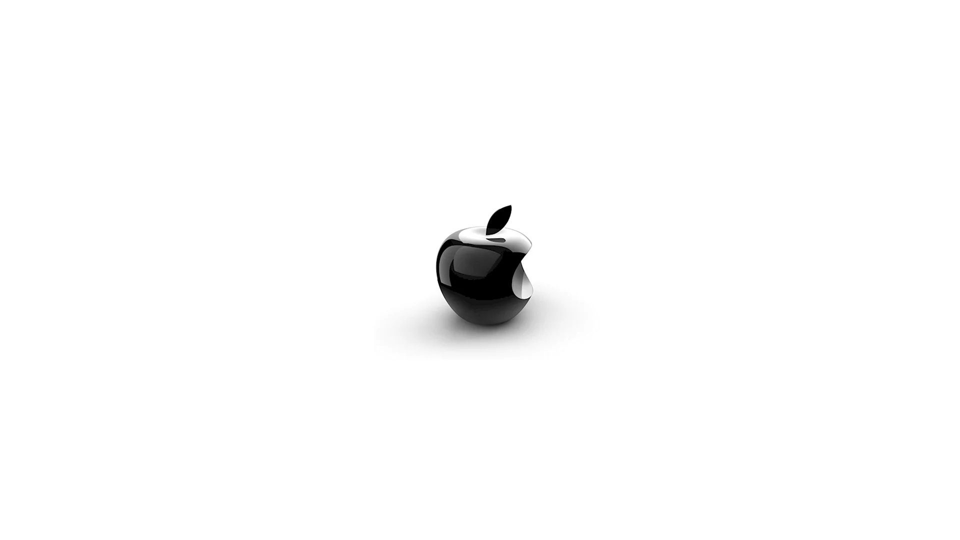Белое яблоко на черном фоне