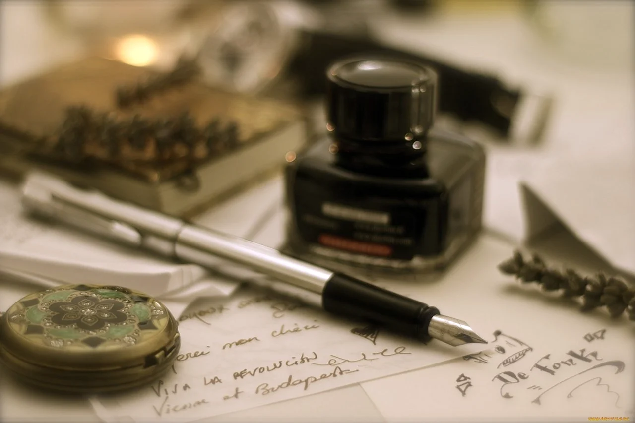 Чернильница и ручка с пером