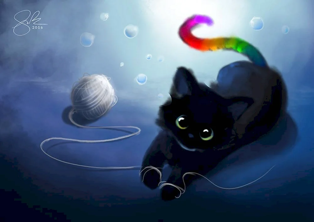 Черный котенок с клубком