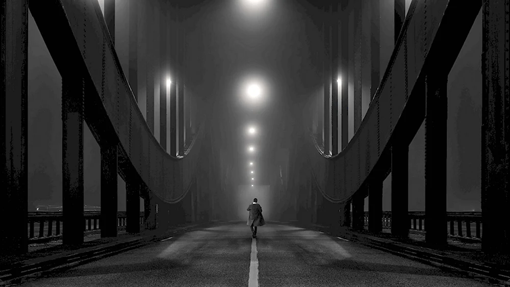 Одинокий человек на мосту
