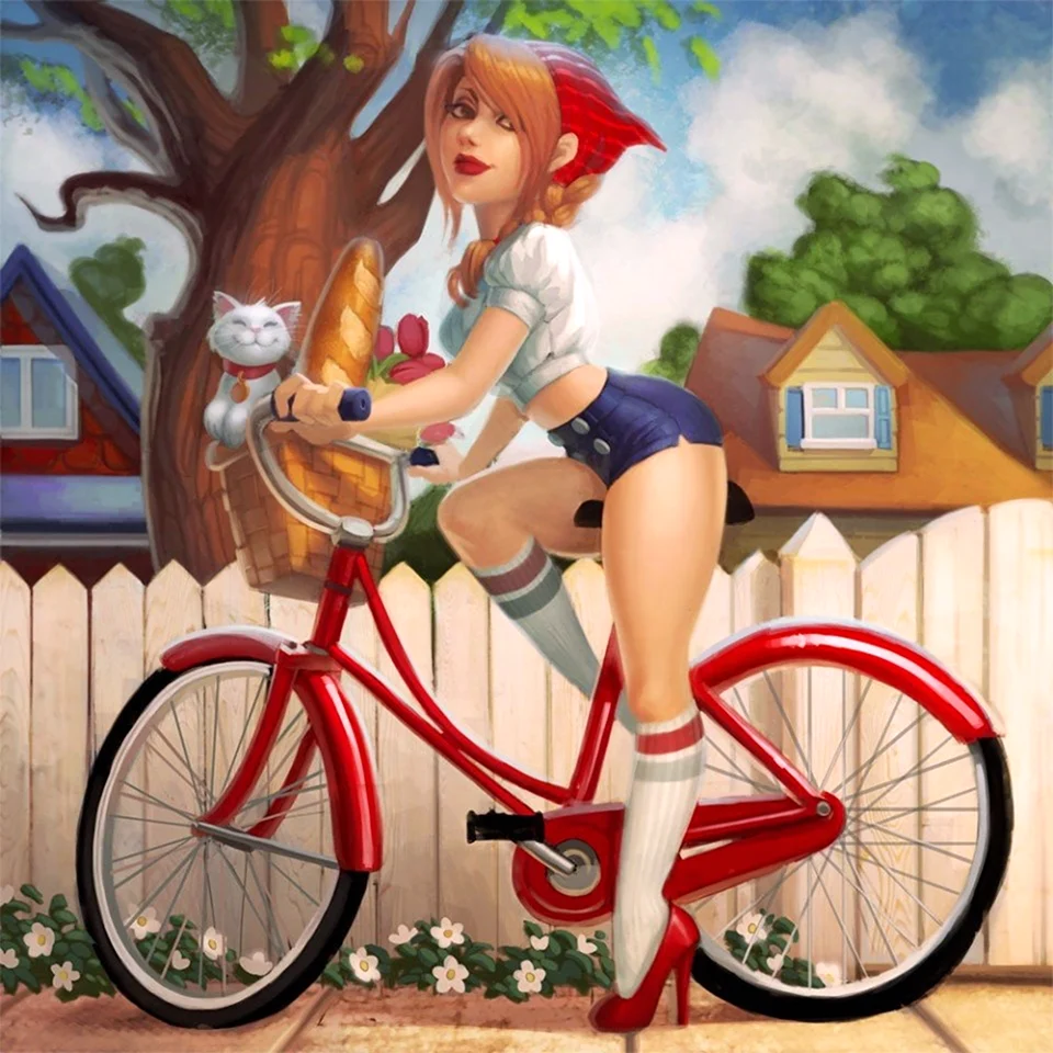 Рыжая девушка на велосипеде