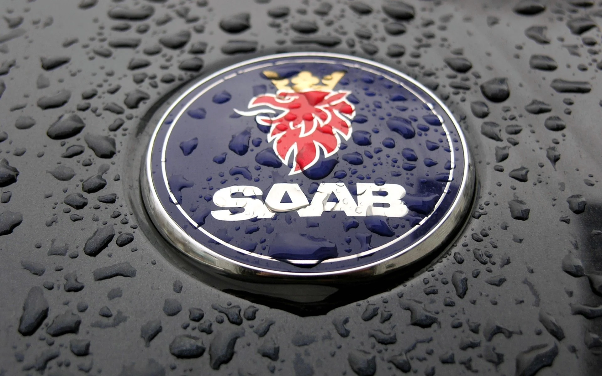 Saab эмблема