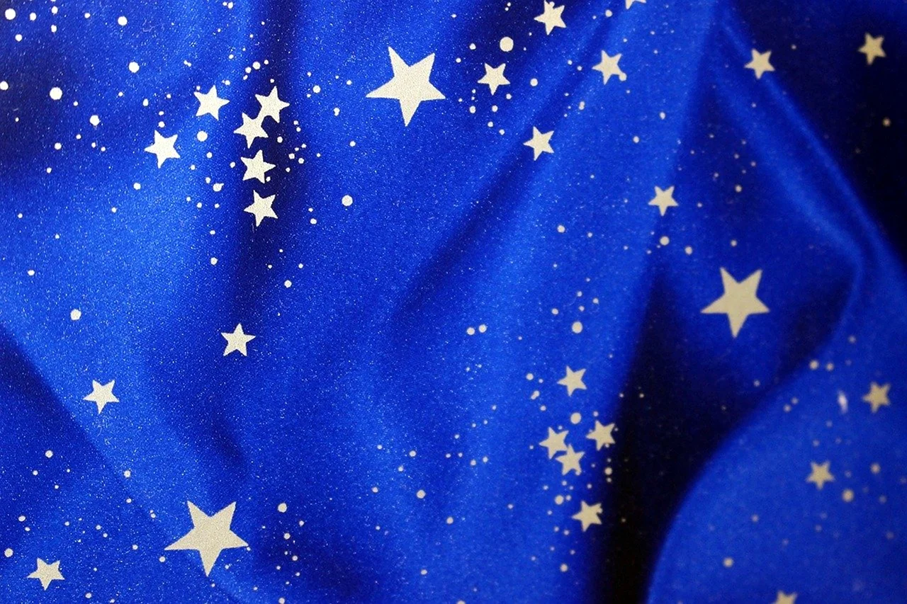Синяя ткань с золотыми звездами