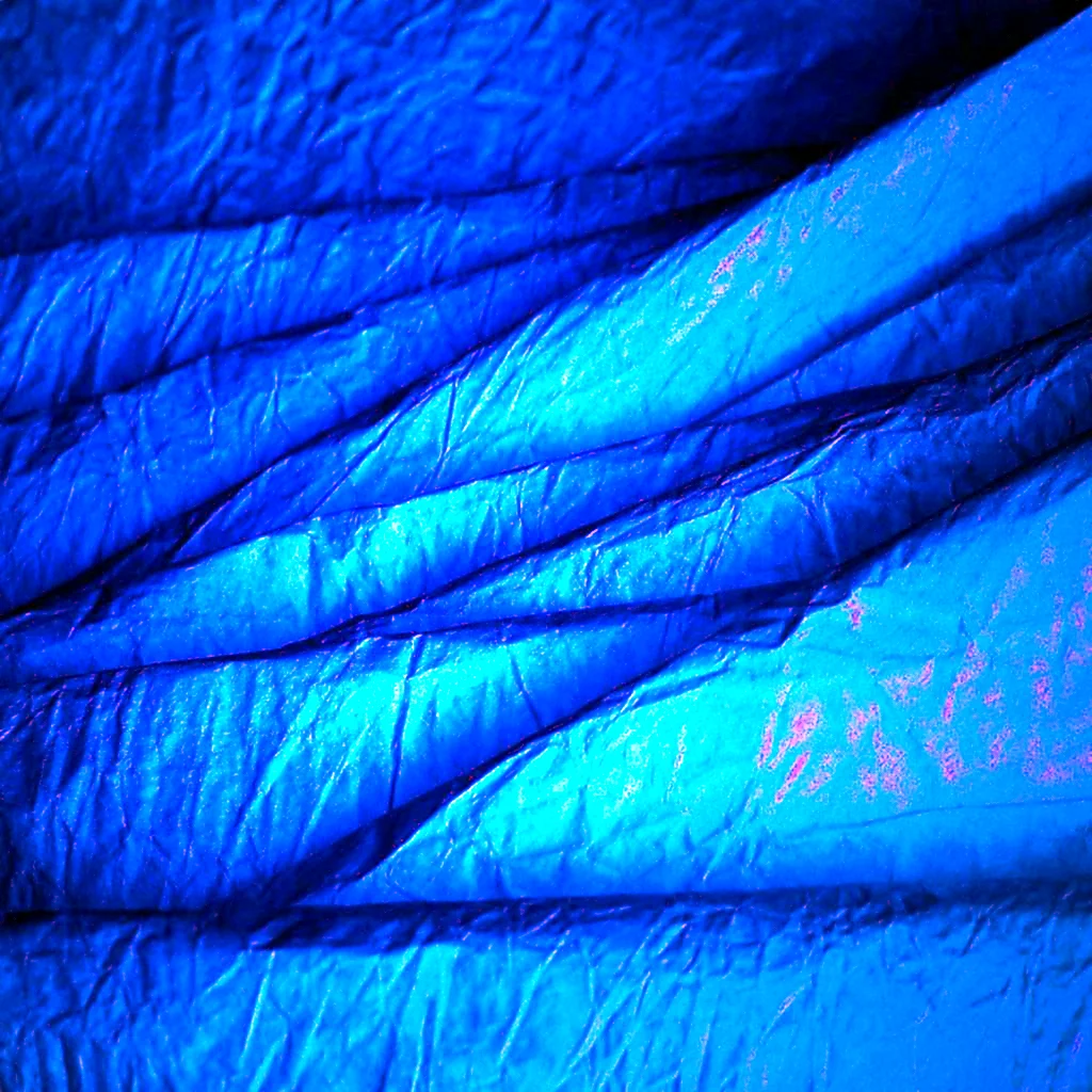 Текстура синего одеяла