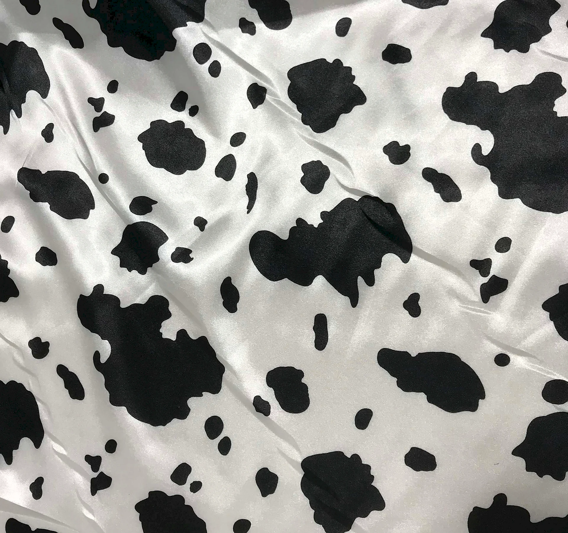 Ткань с коровьим принтом